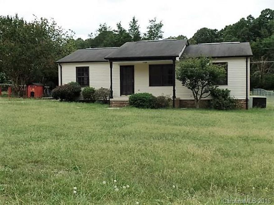 Very Cute Ranch with loads of charm and upgrades. You will be surprised when you enter this home to find an Open Floorplan. It features large Great Room with ceiling beams, 3 bedrooms and 1 Full Bath. New carpet has been installed in all bedrooms and hallway is covered in tile.  Kitchen has tall dark upper cabinets with a HUGE island that is ideal for entertaining and can serve as a Dining Bar. Counter top gas stove with built in wall oven. Gorgeous bath with deep soaker tub and spacious vanity.