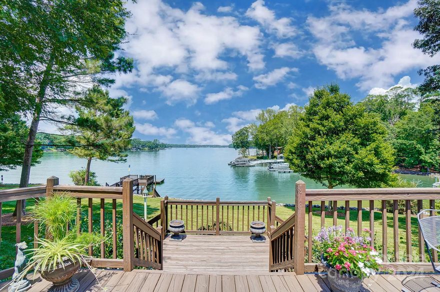 Lake Wylie waterfront home with AMAZING big water views. Home has a wonderful layout, updated baths & kitchen, stunning vaulted great room with tons of natural light. Seller says it's been her happy place- watching people enjoying boating, fishing, waterskiing & seeing wildlife such as ducks, deer, birds & yes even a Bald Eagle or two. Lot is one of a kind offering privacy, mature landscaping trees, plants & shrubs. Deep water dock, entire shoreline stabilized w/ rock. Tucked away from the main channel, so you get the views while not experiencing boats coming so close to your dock. Huge rear deck with lots of space for entertaining and peaceful relaxing times. 
Workshop/storage room is great for lawn & boating equipment, golf cart, kayaks, etc. Located in the heart of the Lake Wylie with easy commutes to area schools, shopping, grocery, dining, area hospitals, Uptown Charlotte & our International Airport. Award winning schools & low SC taxes! Ready for you to make it your own.