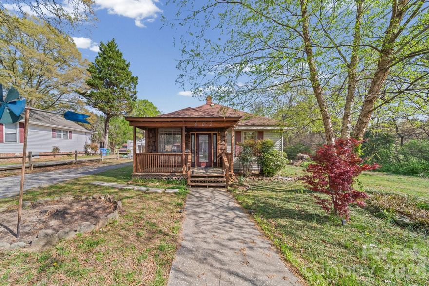 ***NEW PRICE*** | Tucked away at the end of a dead-end street, 402 Edgemont Street offers a rare blend of semi-seclusion and modern versatility. This isn’t just a spacious 2-bedroom home; it’s a multi-functional sanctuary spanning over 1,300 square feet of thoughtfully refined living space. From the moment you step onto the inviting covered front porch, the home’s charm is evident, leading you into a stylish kitchen where sleek granite countertops and some modern finishes await your culinary adventures. The interior flows seamlessly, balancing classic comfort with the contemporary updates today’s buyers crave.

Outside, the property continues to deliver with a spacious back yard, and a 1-car detached garage that includes a dedicated storage area for ultimate organization. Just minutes to downtown Albemarle where you can enjoy shopping, restaurants and take advantage of the social district. Short drive to Badin Lake & Lake Tillery plus Morrow Mountain, Uwharries and Wineries! At 402 Edgemont, you aren't just buying a house; you’re securing a lifestyle defined by minimal traffic, maximum quietude, and the freedom to make every square foot your own.