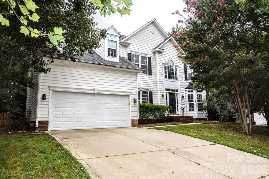 Beautiful home in popular Ash Grove section of Brandon Oaks . Just a short walk to exceptional community amenities 2 pools, fishing lake, tennis courts and 5 minutes from shopping, restaurants, and movie theaters. Almost 1/3 acre lot with fenced yard and 5 large bedrooms in this 3228 sq. ft home. Stunning 2 story foyer, formal living, dining room, and office all with pretty bamboo floors. Fabulous kitchen with 42 inch custom cabinets, granite countertops, island w/cooktop, large pantry, stainless appliances and double oven with convection. More inviting gathering places in family room w/gas fireplace, stone surround and TV  above or the cheery sunroom overlooking the back deck and yard. New LVP flooring in kitchen and family room. Huge Master suite w/ensuite bath, his and her vanities, garden tub, oversized shower and big walk-in closet. Shaded backyard has natural area and storage shed or cute playhouse. Excellent nearby Schools- low Union County taxes. Unique features of home includes intercom system, laundry shoot, irrigation, and security system. Roof and AC less than 10 years old. Water heater replaced in 2018, dishwasher in 2024.