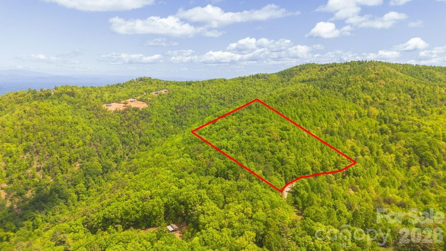 Discover 17.5 acres of unrestricted land in Morganton, offering a rare opportunity for a private mountain retreat, hunting property, investment tract, or future homesite in Western North Carolina. This versatile acreage features a flowing creek ideal for gold panning, rolling terrain, and breathtaking ridge-line and mountain views.

With no HOA and no deed restrictions, this property is perfect for tiny homes, cabins, mobile homes, RV use, short-term rentals, or off-grid living. Abundant wildlife makes it an excellent option for hunting land or recreational use, and its proximity to a nearby wildlife management area adds even more appeal for outdoor enthusiasts.

Enjoy the privacy and seclusion buyers are searching for, while still being within a convenient drive to downtown Morganton, Lake James, and Pisgah National Forest. Whether you’re looking for North Carolina mountain land, acreage with a creek, land for sale in Morganton NC, or unrestricted property with views, this tract checks all the boxes.

Don’t miss this chance to own 17.5 acres of prime Western NC land with endless potential.