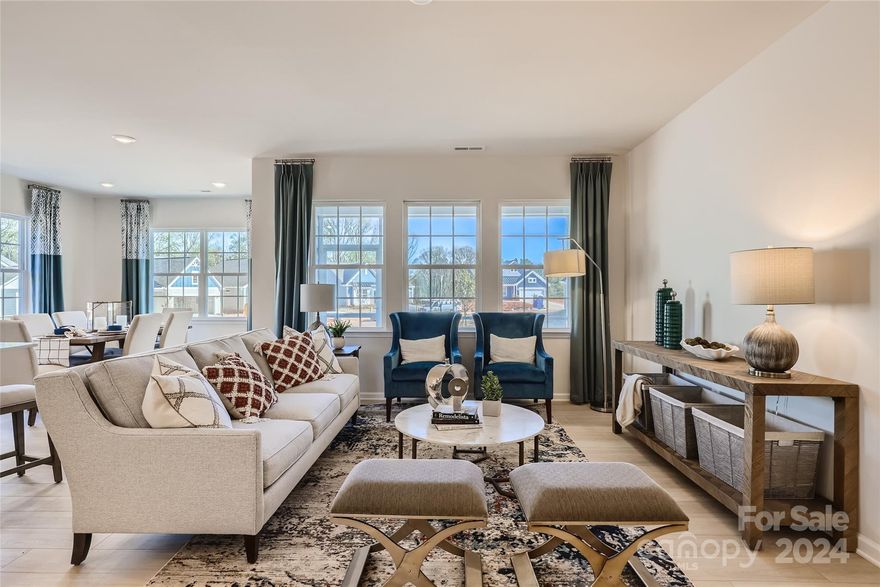 Lovely ranch home with open design and huge kitchen island overlooking the family room. Two guest rooms separate from the primary suite for privacy. Primary suite accommodates large furniture and has a spacious bath area with large shower/built in bench, double sinks, and walk-in closet. For those that enjoy outdoor time, this home has a covered patio in the rear. Come enjoy one level living.