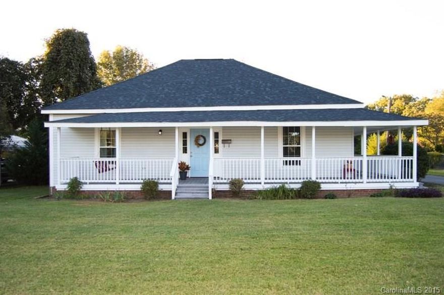 Turn of the century home loaded with character? Updated and gracious living spaces. HUGE back yard! Wrap around front porch. 3BR/2BA, hardwoods, 4 fireplaces (2 working with gas logs), Big laundry/utility room, New Windows 2008, New Roof 2014, Large Foyer, Crown moldings, Deck. Updated and large kitchen with walk in Pantry, Island with sink. Fabulous Fort Mill neighborhood and great schools! New driveway last year. Full length Attic ready for renovation for additional living space.