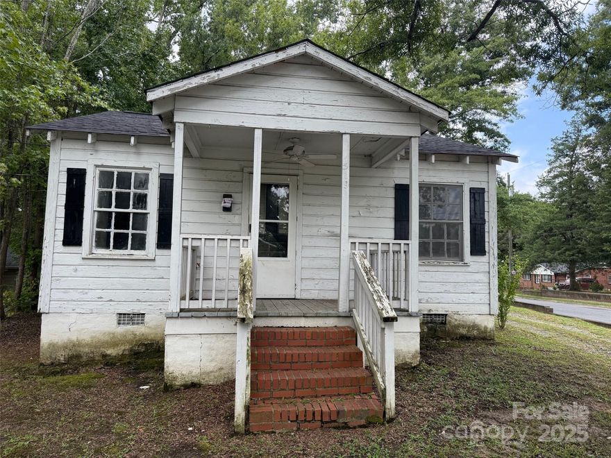 This home has great potential for a fixer-upper to flip, renovate and rent, or renovate for your own personal home.  A new roof was installed 2024.    Don't miss out on the chance to transform this property into a profitable venture or a wonderful home.  Bring your vision and make it a reality!