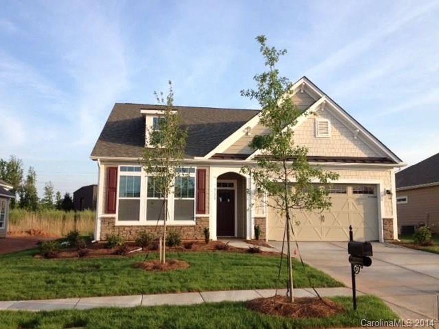 This beautiful 3 bedrooms ranch has many wonderful features like granite count tops in kitchen and bathrooms, stainless steel appliance with gas range, hardwood flooring are in foyer, dining room, great room, kitchen and nook, tile flooring are in all bathrooms and laundry room/mud room, tile backsplash in kitchen and master bath. HD link pre wire in great room, fully sod yard with irrigation system, paint and finished 2 car garage with 8 foot tall garage door, maintenance free living ...