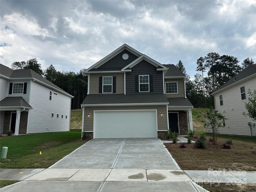 This BRAND NEW 4 bed, 2.5 bath, 2,098 sq. ft. home in Charlotte, NC is waiting for you, just minutes from Lake Wylie! A two-story foyer welcomes you into a gorgeous open plan including a large living room, dining area and eat-in kitchen. Beautiful luxury vinyl plank floors, a breakfast bar and plenty of natural light make for a comfortable place to relax and entertain. Upgrades include modern light fixtures, stainless steel appliances, a tile backsplash and quartz countertops. The backyard patio is perfect for grilling or having that morning cup of coffee! Upstairs, your primary bedroom boasts a walk-in closet and en suite bath with a dual vanity and tiled shower. Three additional bedrooms and a bonus loft area share a second full bath. Washer and dryer are included for resident use. Your new neighborhood is located near S Tryon St., Steele Creek Rd., The Palisades Country Club, McDowell Nature Reserve, restaurants, grocers and shopping.