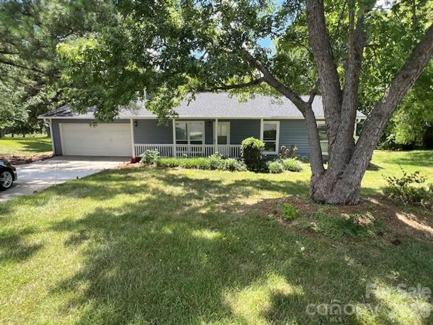 Welcome to this beautifully updated ranch-style home in the desirable Walden on Carmel community! This 3-bedroom, 2-bathroom home offers a spacious, open layout with neutral tones and modern finishes throughout. The great room features a charming woodburning, corner stone fireplace, perfect for cozy nights in. The kitchen is a chef’s dream with stainless steel appliances, plenty of cabinet space and a bright dining area for family meals. The master suite offers a private en-suite bath and ample closet space. Recent 2024 updates include fresh interior and exterior paint, new flooring throughout the main living areas, updated appliances, new toilets and a new garage door opener and springs. The roof and gutters were replaced in 2023 for added peace of mind. Enjoy the tranquil setting as this home backs up to the serene wooded McMullen Creek, providing privacy and natural beauty. No HOA! A perfect blend of comfort, style, and location—don’t miss out! Portion of rear yard is in flood zone and does not require flood insurance. Showings begin Sunday 3/8 at 1:00.