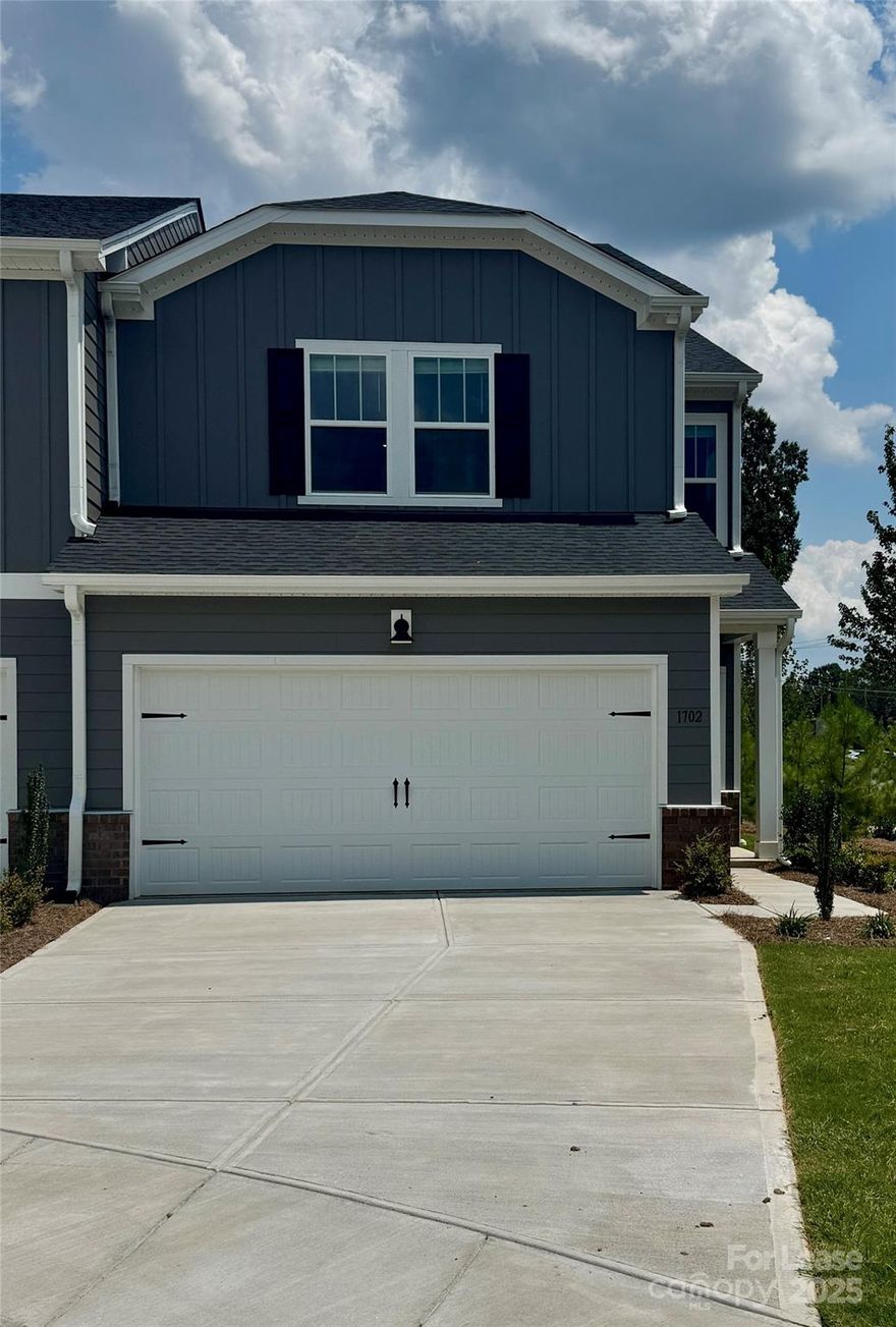 Brand new, end unit, 3Br/2.5BA townhouse in Union County. This stunning townhouse boasts a modern open concept floorplan, perfect for entertaining and everyday living. The kitchen is a chef's dream with a large island, ample counter space, an oversized pantry, and beautiful granite countertops. The main floor is adorned with enhanced vinyl plank flooring, adding a touch of elegance to the living areas. The spacious primary bedroom and bathroom offer a private retreat, while the additional two bedrooms provide plenty of space for guests or a home office. The townhouse also includes a washer and dryer for your convenience. The large entryway and two-car attached garage add to the functionality of the home. Step outside to your outdoor patio, perfect for enjoying the outdoors. The location is unbeatable, with shopping, dining, entertainment, and major transportation arteries just a short distance away. Experience the perfect blend of comfort, style, and convenience.