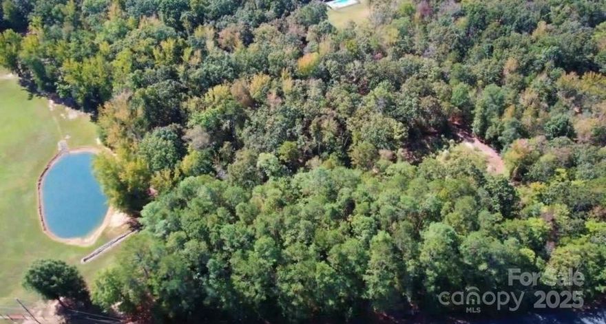 This 2.67 acre private, flat, wooded lot is part of the Cardinal Row. Cardinal Row is almost 11 acres along beautiful Steele Road in Waxhaw that has become 5 homesite. The homesite is surrounded by mature hardwoods to ensure privacy. The lot home site and driveway will be cleared by the seller. The seller will also provide the septic permit. Cardinal Row is the perfect location to build your dream home in the country while still be close to all the amenities you are accustomed to.