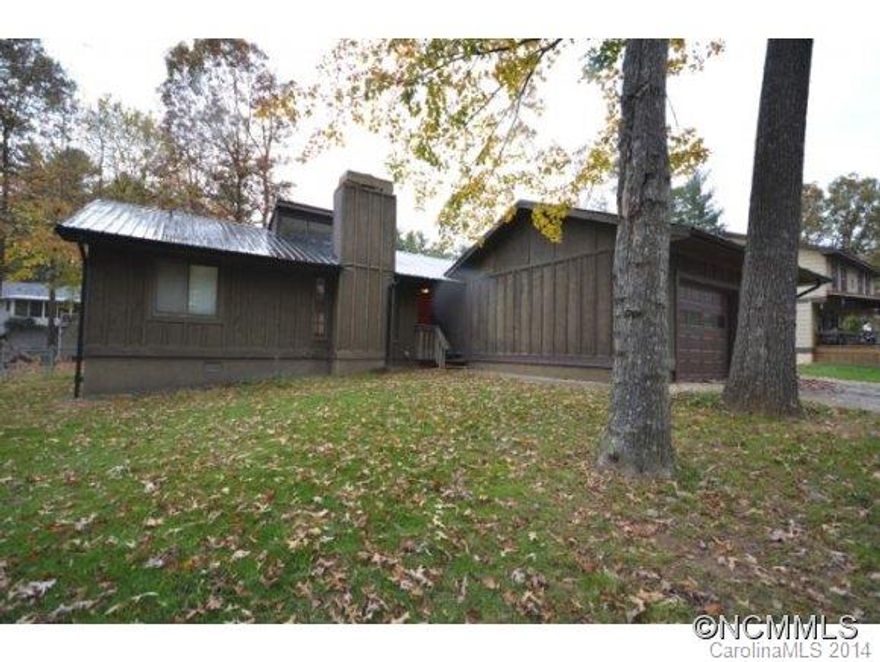 No steps in this gracious 3 bedroom 2 bath home resting on a quiet cul de sac. Designed for easy living with and open flowing floorplan. Escape to the bonus room with custom hand crafted paneling on one wall. Cathedral ceiling in great room lend to airiness with breathtaking stone fireplace to cozy up to on a cold night. Convenient to I26, Airport Road and Biltmore Park.