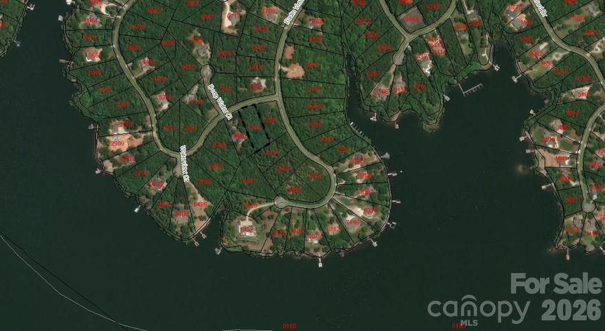 Welcome to Heron Bay, a private gated community on the shores of beautiful Badin Lake—the perfect setting for your full-time residence or weekend retreat. This lot offers a gentle slope at the back, ideal for a basement foundation, and sits among custom homes in a peaceful natural setting. Community amenities include: Keypad-gated entrance for peace of mind, Lantern-lit paved streets and underground utilities, a waterfront clubhouse with boat launch and 15-slip aluminum dock, paved walking trails to enjoy the outdoors and a fenced boat storage area for convenience. Whether you’re envisioning a relaxing getaway or your forever home, Heron Bay has it all. Don’t miss this opportunity to create the lake lifestyle you’ve always dreamed of!