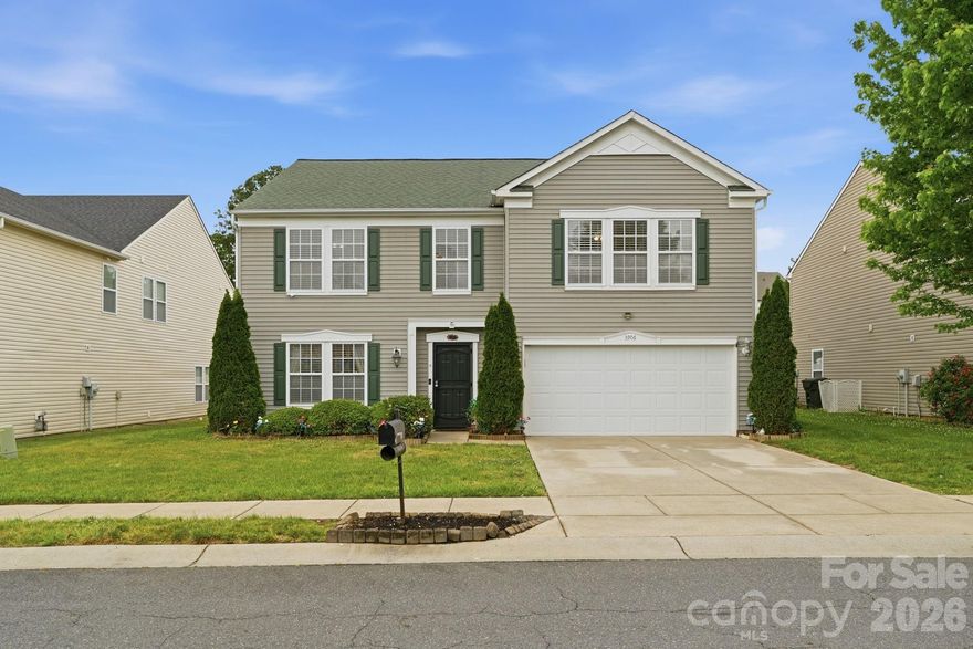 This home features one of the most desirable floor plans in Clover Meadows, offering an open-concept layout with spacious rooms throughout. The main level flows seamlessly between the living room, formal and informal dining areas and expansive kitchen—ideal for both everyday living and entertaining. The kitchen is well-appointed with ample counter space and cabinetry, making it a true chef’s delight. Upstairs, the oversized primary suite includes a large sitting area, creating a perfect private retreat. Two additional generously sized bedrooms, a full bath, and a versatile loft provide plenty of space for family and friends. Step outside to enjoy a private, fenced backyard featuring a brand-new deck and mature landscaping—perfect for relaxing or hosting gatherings. Additional highlights include walk-in closets in every bedroom, a recently installed irrigation system, powered shed as well as updated garage door and HVAC systems. Situated within the sought-after Clover School District, this move-in-ready home offers both comfort and the best of everyday living - Schedule your showing today!