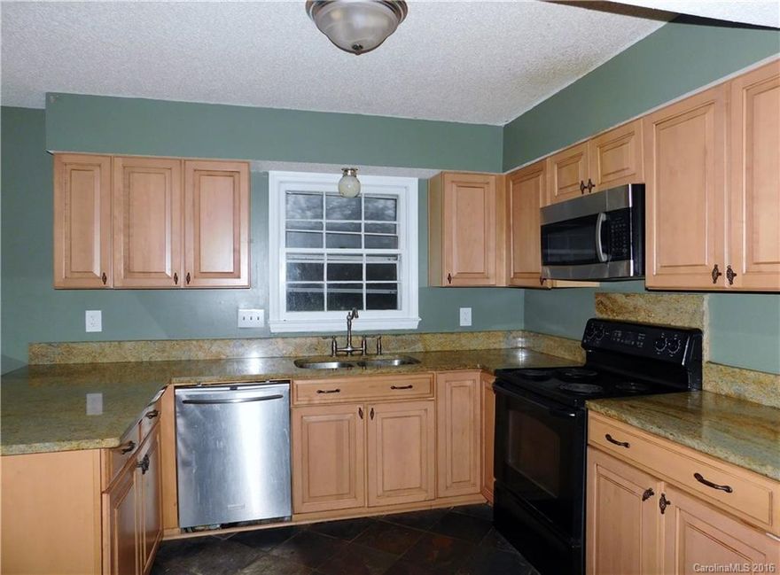 Great Potential in this 2 Story in prime Southwest Charlotte location with Updated Granite Countertops and Cabinets in Kitchen. Washer and Dryer included. Great for Investment or add your own finishing touches to your own home. Needs TLC. Has newer Roof. Has been previously leased and is now vacant. Easy to show!