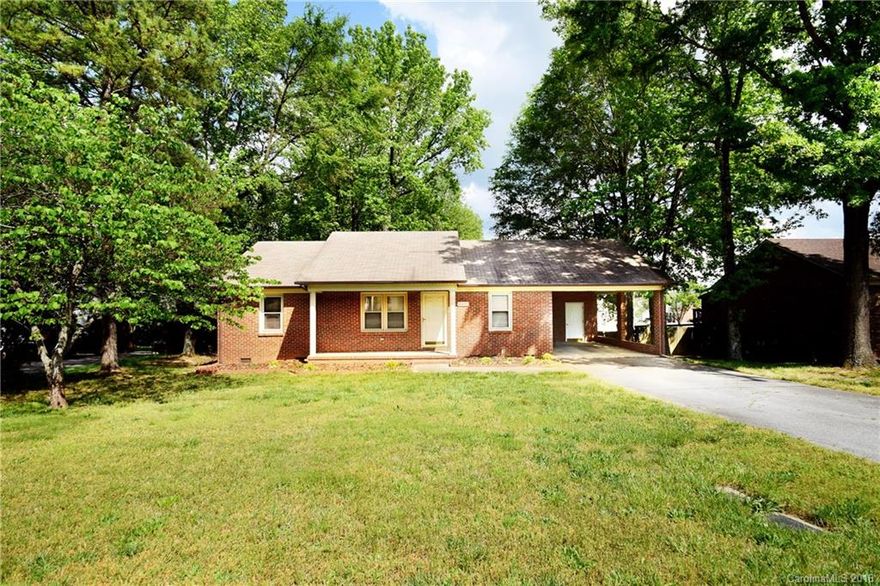 Don't wait! This charming 3 bedroom 2 bath home is move-in ready and will not last! This home features a split bedroom plan, two full baths, good size bedrooms with plenty of closet space and open living and dining area. Walk out the French doors to the deck overlooking a large backyard, a perfect spot for morning coffee or afternoon tea! Covered car port with storage area and paved driveway for off street parking. Minutes from I-85.