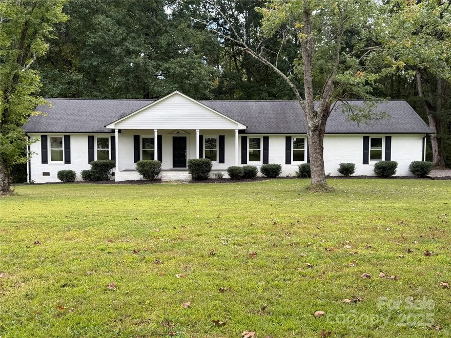 Looking for peace and quiet within the sought-after North Lincoln school district? Tucked back from the road on 1.88 wooded acres, this beautifully renovated 3-bed, 2-bath home offers nearly 2,000 sq ft and an attached 2-car garage. A classic floor plan blends sturdy construction with fresh updates you’ll love—new kitchen cabinetry, brand-new appliances, and abundant storage. The spacious living room with feature fireplace invites both relaxing evenings and lively gatherings. Bathrooms have been thoughtfully redesigned for comfort and function, while the bedrooms—brightened by new windows—offer generous space and natural light. Practical touches include a drop zone from the garage and a laundry room set away from the bedrooms. Step onto the large back deck to savor your morning coffee, watch deer drift through the trees, or host future get-togethers. A home built for memories and moments—ready for you to make it your own.