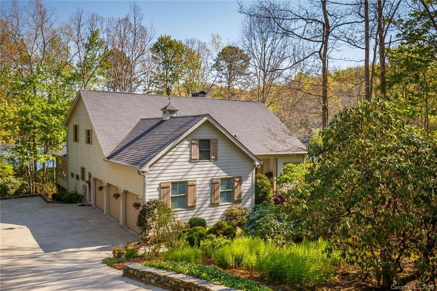 On a premier .78 acre lot w/views from virtually every room, this 3BR/4B, 3 car garage home is located on Lake Atagahi. Open floor plan has GR w/vaulted ceiling & fireplace that also opens to MBR, cherry h/w floors, 1 level living, large sunroom & deck w/spectacular lake views & beautiful landscaping. Level walk to lake. 2nd floor has 2BRs each w/full bath, office, 2nd laundry room & storage area above garage. Elegant living in CF. CF UAF $8,000