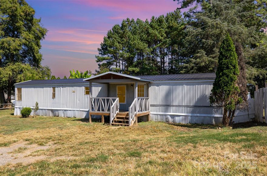 Enjoy the best of country living in this well-maintained manufactured home featuring 2 bedrooms and 2 full bathrooms. With a comfortable layout and a peaceful setting, this home offers plenty of space to relax and make your own. Don’t miss the chance to own a property that combines convenience, affordability, and charm—all in a great location! Large private lot allows for space for work or pleasure, either it's building a workshop or enjoying the outdoors, fenced in yard and additional side yard offers plenty of opportunities.
