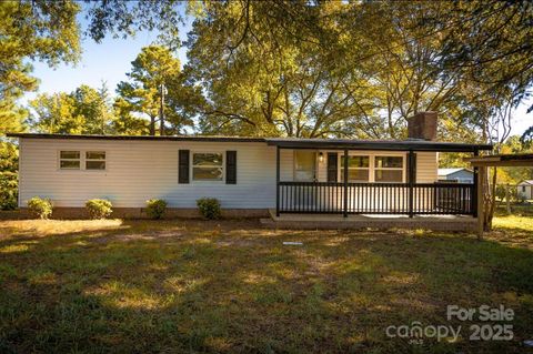 Photo of 45625 Broadway Road, Albemarle, NC 28001 (MLS # 4312758)