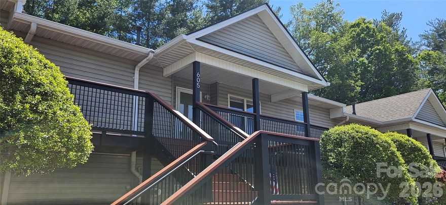 Nestled in a highly desirable neighborhood, 605 Carlyle Way in Asheville, NC offers a beautifully refreshed and completely move-in-ready living experience. This immaculate 2-bedroom, 2-bathroom home shines from top to bottom, boasting brand-new luxury vinyl plank (LVP) flooring and a crisp coat of fresh paint throughout. The heart of the home is the stunning kitchen, which features gorgeous new countertops, a stylish new backsplash, a brand-new range, and sleek new fixtures that make cooking an absolute delight. Both bathrooms have been tastefully updated with modern finishes and updated fixtures, blending style and functionality seamlessly. Beyond the gorgeous interior, you can step outside to your own private back deck—the perfect, peaceful retreat for enjoying your morning coffee or unwinding in the mountain air. Combining comprehensive modern upgrades with unparalleled comfort, this Asheville gem is truly ready to welcome you home.