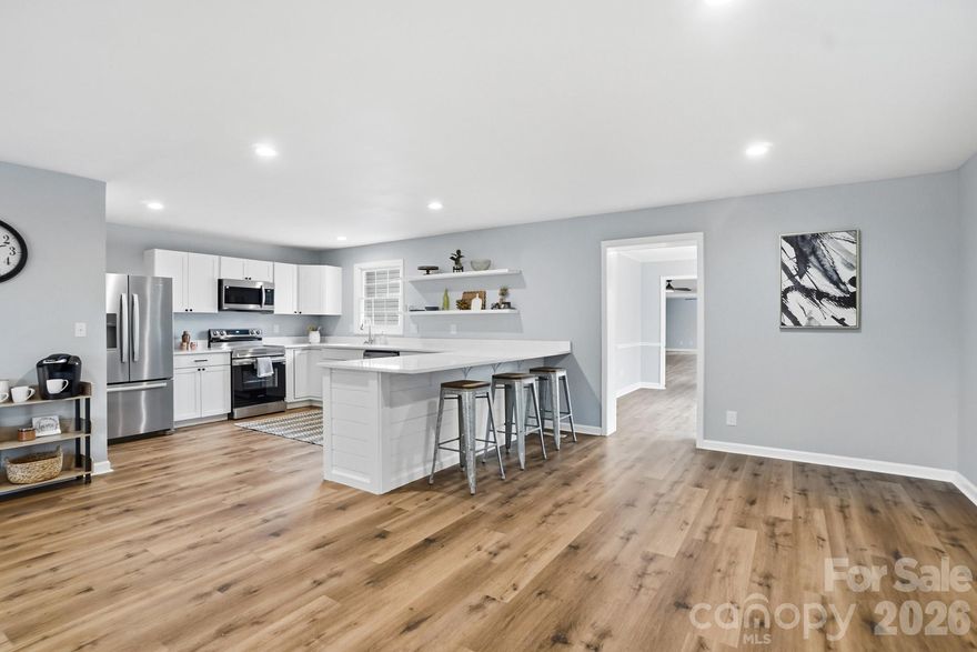 Newly upfitted 4BR/3BA home on over 1 acre with private pool, NO HOAS it's a rare duplex-style layout! 1404 Old Mill Rd offers exceptional flexibility with two full kitchens, two living rooms, and separate entrances—perfect for multi-generational living, in-law suite, or rental potential. Recent upfits throughout, refreshed flooring, paint, modern fixtures updated kitchen and baths, see features list in attachments for more, Enjoy summer entertaining by the in-ground pool and patio and the privacy of a large lot, just minutes from downtown Lincolnton and Hwy 321. This is a move-in-ready property with endless possibilities!