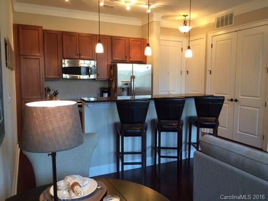 Wonderful Myers Park Location, Walk to shops on Selwyn, beautiful new hardwoods in living area, custom built in shelving, furnishings are negotiable!! Looks like a model home! Great natural light!! This is a studio floorplan