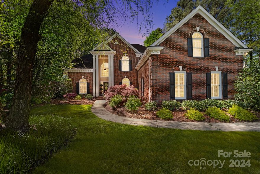 WATERFRONT in OVERLOOK! This is the one you have been waiting for! Welcome home to this updated all brick 5 bedroom 4 full bath home on a private wooded waterfront .80 acre lot. 220' of shoreline including your own private composite board-based dock with covered gazebo & boat slip. After a day on the lake, relax at your back yard fire pit or comfortable awning covered deck. Inside, enjoy beautiful water views from every back window! Bright and airy with fresh neutral paint throughout. The great room with gas fireplace is open to the fully updated kitchen with new cabinetry, leathered quartzite counters and new smart appliances 2020. A private bedroom on the first floor & adjacent remodeled full bath with walk-in shower makes a perfect guest suite or office. Refinished hardwood floors upstairs and downstairs 2022. New carpet in bonus room & back stairs 2022. Gutter Helmets on all gutters. Encapsulated crawl space. Updated lighting. Irrigation pump at dock installed 2020. A must see!!