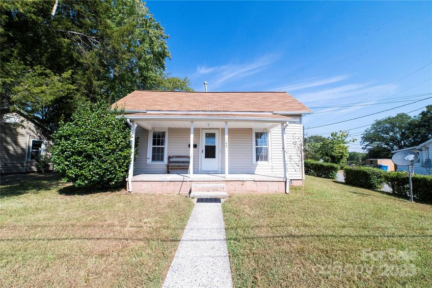 This 2-bedroom, 1-bath home with the option for a flex room or office, combines historic charm and plenty of opportunity to make it your own. Sitting on a corner lot, the layout provides comfortable living spaces with potential for further improvements. A detached carport with enclosed storage adds convenience and functionality. Its' prime location near everyday amenities and just minutes from Downtown makes it a smart choice for first-time buyers seeking value or investors looking for rental or resale potential. This property delivers character, location, and opportunity in one package.