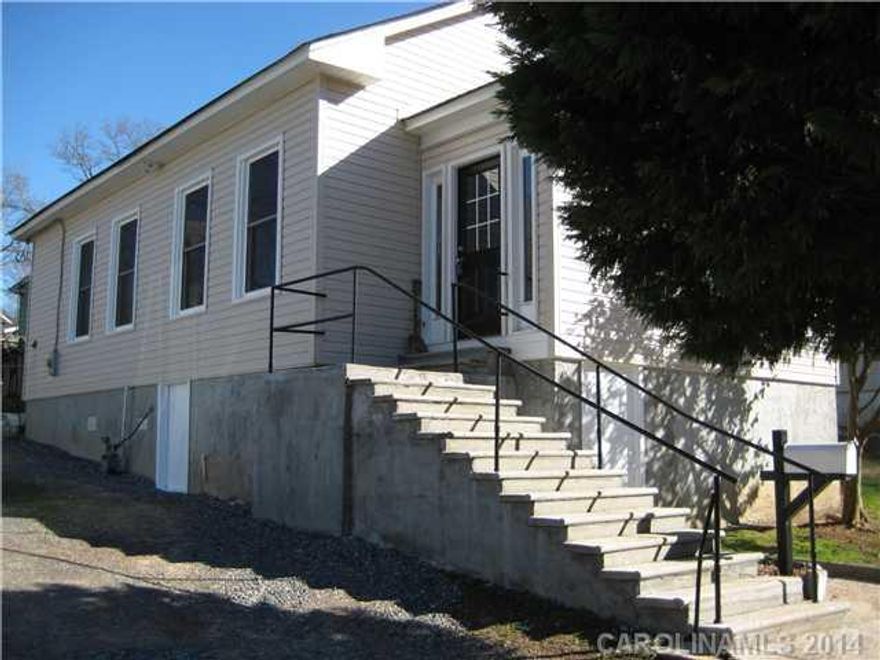 Close to I-77, 2 bedrooms w/bonus (could be 3rd bedroom, has closet but no windows), new vinyl siding & windows, 2 gas packs, new laminate floors in formal dining, family room, kitchen, breakfast area, master bedroom & full bath, stove 2 years old, panel box upgraded to 220, fenced backyard, age is approximate.