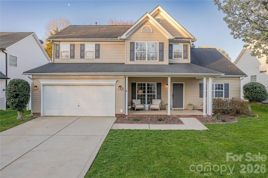 Situated on a premium lot on a cul-de-sac street in desirable Waterstone, this primary-on-the-main has been meticulously updated and is move-in ready.  A rocking chair front porch welcomes guests.  Grand 2-story foyer is flanked by French Door enclosed study.  Hardwood floors unite the open concept main level, which is highlighted by the 2-story great room with fireplace.  Updated Chef’s Kitchen features granite counters, refinished cabinets, stainless steel appliances and tile backsplash.  Primary-on-the-main suite includes vaulted ceiling and detailed mill work.  Spa like primary bath includes double vanity, free standing tub and beautiful glass enclosed tile shower.  Upstairs features 3 additional generously sized bedrooms.  Fenced backyard has oversized entertaining patio, playhouse and mature landscaping.  Conveniently located moments from premium shopping, dining and entertainment with award winning Ft Mill school assignments and top notch community amenities including pool, clubhouse and playgrounds, this is a must see!