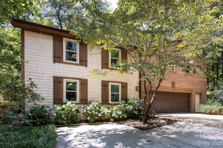 One-of-a-kind home in the coveted equestrian community, Black Horse Run. Rare multi-generational home, each level with its own full kitchen, dining and living areas, and primary suite. This 5 bedroom/5 bathroom home lives big! In addition to the living room, kitchen, and dining room, the first floor features 2 bedrooms, 2 full baths, a spacious screened porch, and a two-car garage. The second floor features a second living room, kitchen with breakfast area, dining room, 3 bedrooms, 3 full bathrooms, flex room, playroom, and a deck. Both levels have their own laundry connections. Most windows were recently replaced and appliances are newer. Very private lot with established trees and gardens--wildlife is plentiful here! Black Horse Run offers stables, a riding arena, riding trails, an outdoor pool, a clubhouse, tennis courts, and a pond. Additional info available at www.blackhorserun-sc.com. Minutes away from abundant dining, retail, and 521/I-485.