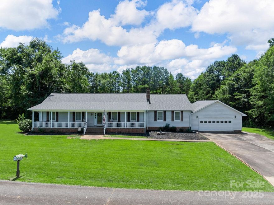 Life is great at 121 Maude Rd.- Enjoy the quiet, country setting, watch wildlife pass, sunsets & listen to nature from the 49'x8' rocking chair front porch.  This 3 BR/2 BA ranch home sits on an acre of land ready for new owners to enjoy planting a huge garden, raising some chickens for your own fresh eggs, hosting gatherings from the rear screened porch & cooling off in the inground pool w/sliding board. Laminate wood floors throughout the main living areas & carpeted BR's.  The living room has exposed beams & built-in bookcase by the stone gas log fireplace.  Wide case openings allow conversations to flow into the kitchen & dining room.  The kitchen has tons of cabinets, counterspace, center island, built-in desk area & breakfast bar.  Stainless appliances- plus washer & dryer.  Recreation room w/built-in bookcases, an office & workspace area plus a large walk-in closet. Oversized 2 car garage & 20'x30' metal bldg. Newer roof & HVAC.  Call today for your private viewing!