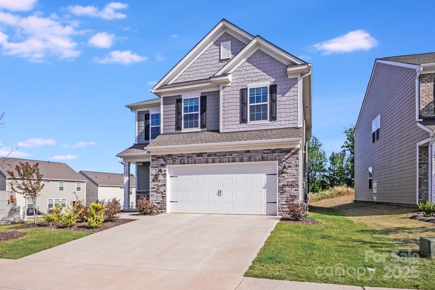 Voted the #1 hottest community in Fort Mill per The Charlotte Business Journal, now has a Price Improvement! 
Now is the perfect time to make this beautiful, nearly-new home yours. Featuring an open floor plan and a stunning, oversized quartz island, this kitchen is as functional as it is elegant—offering ample space for meal prep, entertaining, or casual dining.
Upstairs, you'll find a spacious primary ensuite, three generously sized bedrooms, a convenient laundry room, and a massive loft area that offers endless possibilities—think media room, home office, or play space.
Location? Unbeatable. Just minutes from top-rated schools, downtown Fort Mill, The Shops at Arden Mill, and only 10 minutes to Catawba River access. Lake Wylie is just 15 minutes away, with I-77 nearby for an easy 32-minute commute to Charlotte Douglas International Airport. Plus, a new Harris Teeter is currently underway just 5 minutes away at Dobys Bridge Rd and Fort Mill Parkway.
Coming soon: a highly anticipated amenity center featuring a pool, cabana, tennis, pickle ball courts, and access to the scenic Carolina Thread Trail system. This is more than just a home—it's a lifestyle in one of the most desirable communities in the area.