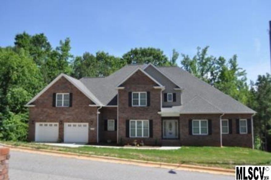 Unbelievable amount of space in this all brick 2-story home w/9’ ceilings & full bsmt. Spacious rooms throughout with HWDs & tile on main level w/carpet in BRs. 2-story GR has FP, recessed lighting and see-thru window to kitchen.  Plenty of cabinets in KIT w/granite counter tops, SS appl., island & b’fast area plus there is a formal DR. Master has trey ceiling, his & her walk-in closets & sep. ‘office.’ Master BA has sep. granite top vanities, bronze fixtures,  jetted tub, walk-in tile shower plus a linen closet. 2nd BR is on main level w/attached BA. Large main floor laundry room has sink & cabinet. 2nd level has 2 huge BRs, each having its own BA & walk-in closet, plus a bonus room w/closets & ½ BA.  Full bsmt has a finished room w/door to exterior & full BA that has laundry hook-ups. Unfinished part has tall ceilings & partially framed for endless possibilities w/2 double door walk-outs. Home has 2 hot water heaters & dual HVAC units w/city water & sewer situated on .8 acres.