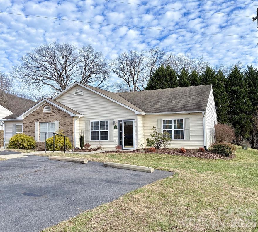 PRICE REDUCTION on this income-producing 2-bedroom, 2-bath townhome on the east side of Black Mountain. Property offers a proven 10-plus-year history of consistent rental occupancy, making it a strong investment opportunity with immediate income potential.

Just minutes from downtown, future occupants will enjoy quick access to restaurants, shops, and local attractions. Outdoor enthusiasts will love being close to hiking and biking trails, as well as scenic Lake Tomahawk.

Designed for low-maintenance living, this single-level home features modest utility costs and low HOA fees of just $100/month, which cover exterior grounds upkeep - ideal for investors seeking a true lock-and-leave property. The layout is comfortable and functional, while the private patio with a concrete slab and new fencing provides a quiet space for relaxing or entertaining. Mountain views from the lot add to the property’s serene appeal.

Whether you're expanding your rental portfolio, searching for a second home, or looking for a move-in ready primary residence, this townhome checks all the boxes.