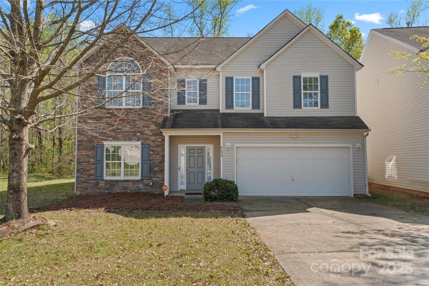 *******Multiple Offers - highest and best due Monday, 4/7 at noon. This move-in ready 4BR/2.5BA located on a private, wooded lot is waiting for you to call it home! Step inside  to find a spacious foyer that leads to an office/flex space and formal dining room, powder room and a cozy family room with wood burning fireplace that opens to the light-filled kitchen with breakfast area and views of the wooded back yard. A private back stair case leads to the generous size primary suite featuring a vaulted ceiling and private bath with dual vanity, garden tub, separate shower and spacious closet. 3 generous size bedrooms with vaulted ceilings, a full bath and a conveniently located laundry room completes the upper level.  The exterior offers a 2 car garage with plenty of space for parking plus storage and a rear patio perfect for enjoying the wooded back yard. Great location on a quiet street minutes to I-485, I-77, shopping, dining, and city amenities.
