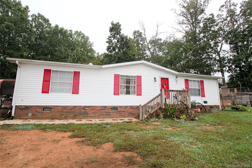 Set back and hidden from the road, this home has plenty of room for growth. Current owner uses expansive land for farming. With plenty of room, the sky is the limit for its usage.  With  a new HVAC system, freshly pumped septic system, new well pump and piping, and countless interior updates, this home is move-in ready. Exterior features two outdoor storage sheds as well as oversized chicken coop and a playhouse (just needs a bit of love to finish).  Experience the tranquility of country living.