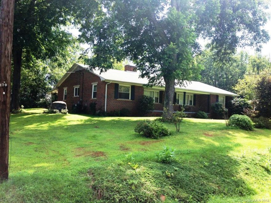 Hard to find 5 bedroom home with a full basement!  Affordable brick ranch with full unfinished basement giving you over 4000 s.f. of space.  Lots of new upgrades including new Trane HVAC unit.  Home has oil backup to help save on utility bills during extreme weather.  Beautiful gleaming hardwoods in all Bedrooms and Living room. Huge kitchen with new appliances and tons of cabinets!  3 car carport at the back of the home, lovely covered front porch and great location just north of Statesville