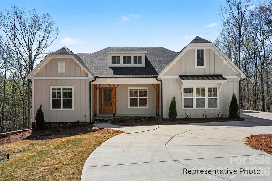 Experience luxury living on 7.5 private acres just minutes from downtown Davidson and the best of the Lake Norman lifestyle. This NEW CONSTRUCTION 4BR, 3.5BA home offers refined design, modern comfort, and exceptional acreage—ideal for recreation, lake toys, or future outbuildings and priced with $100k design/upgrade allowance.

Inside, the open-concept layout centers around an Epicurean Kitchen featuring floor-to-ceiling cabinetry, quartz countertops, double wall ovens, and a large farmhouse island. The kitchen flows into the Casual Dining area with optional serving station, sink, and wine fridge, and into the Family Room with options for coffered ceiling, multiple modern fireplace options, and abundant natural light. A covered rear deck extends the living space outdoors.

The main-level owner’s suite offers a peaceful retreat with a trey ceiling, dual vanities, walk-in shower, spacious walk-in closet, and a bump-out sitting area. Hardwood floors enhance the first floor (excluding secondary bedrooms and full baths).

Upstairs, a generous Retreat/Loft provides flexible space for entertainment or hobbies, along with a 4th bedroom and 3rd full bath—perfect for guests or multigenerational living.

Additional features include an attached 3-car garage, detached 2-car garage, and an encapsulated, conditioned crawl space. Closing cost incentives available with preferred lender.

A rare opportunity to enjoy craftsmanship, comfort, and acreage living in a highly desirable location. Photos/video are representative of previous build and may show options that are upgrades and not scheduled to be included in this property, but could be available depending on contract date. Please confirm pricing, options, etc. with builder representative.