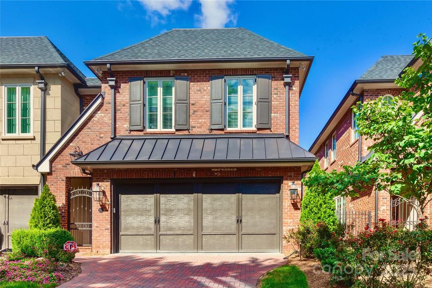 With timeless elegance and modern functionality, this home is a sanctuary of style. The wrought-iron gate and  covered vestibule lead to a grand foyer w/ floor-to-ceiling wainscoting, storage, and elevator infrastructure space. A private study and chic dining/living area showcase refined design. A butler’s pantry w/ wine fridge and walk-in-pantry connect to the chef’s kitchen w/ 12” island, bespoke cabinetry, Wolf gas range, encased Sub-Zero fridge, and a sunny morning room with floor to ceiling windows. The family room opens to a covered porch via pocket sliding doors. Lower the electronic screen for a cozy retreat.  The gorgeous bluestone patio is surrounded by brick walls and mature landscaping. A  2-car garage w/coated concrete & storage, plus a spacious drop zone.
Upstairs, premium features continue:  10” ceilings, custom molding, solid wood doors, bonus space, 2 en-suite BRs w/ double closets, and primary BR w/ spa bath & spacious WIC, laundry room and elevator space.