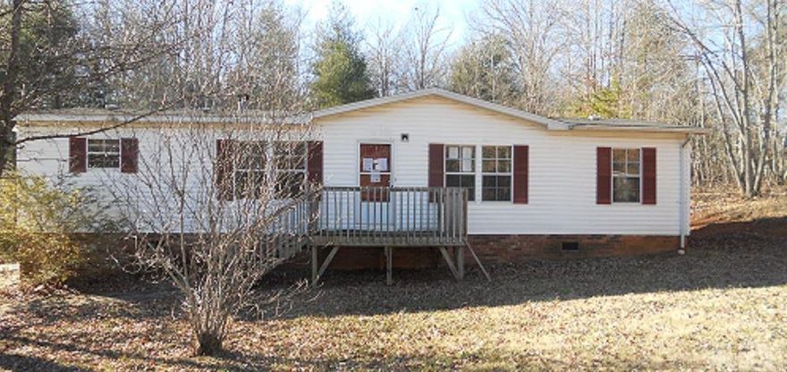 Nicely laid out 3 bedroom 2 bath mobile home, in a quiet, family friendly neighborhood. Complete with open concept living and dining room. Also has a separate den with a fire place and access to the back deck. Master suite has two closets and a large master bath with soaking tub and separate shower. Outside the home has fair sized, level front and back yard. Material facts obtained through tax record. Buyer or buyer's agent to verify all information. Owner occupant offers only through first look period ending 3-30-15.