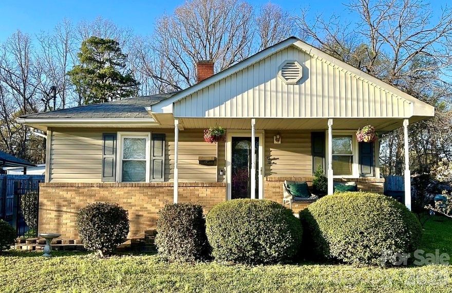 Welcome to this charming bungalow-style home in Gastonia offering character, comfortable living spaces, and added flexibility. This 2-bedroom, 1-bath home features a new roof (April, 2026) spacious living areas, beautiful dark hardwood floors, and fireplaces that add warmth and charm throughout. The inviting living room flows into the dining area and kitchen, which offers ample cabinetry, generous counter space, and island seating for everyday living or entertaining. The home also features a spacious bedroom layout and a large bathroom with plenty of room and storage.

In addition to the home, the property includes a detached studio building previously used as a salon, offering excellent potential for a home office, creative workspace, or possible home-based business.
With its character, flexible space, and convenient Gastonia location, this property presents a unique opportunity for homeowners seeking both comfort and versatility. If you’re looking for a home with character and added flexibility, this is one you’ll definitely want to see.