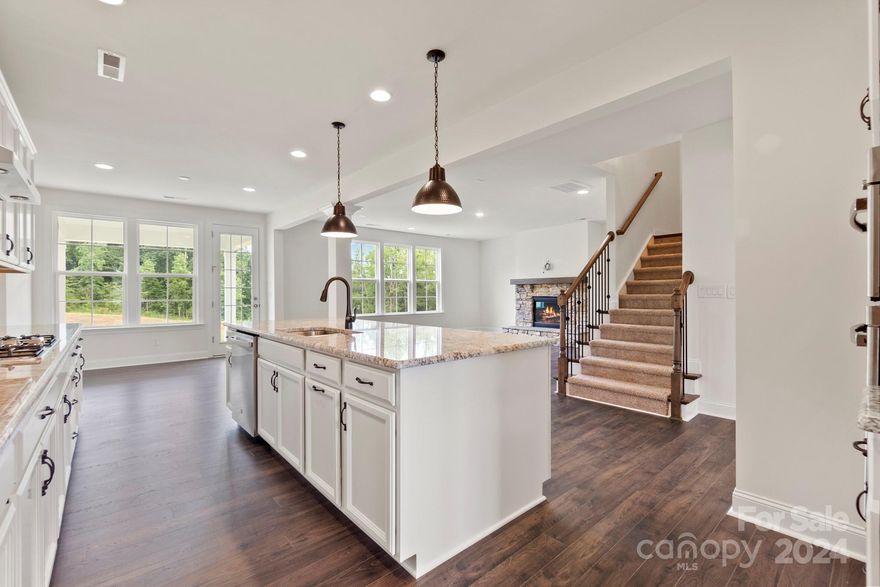 REPRESENTATIVE PHOTOS ADDED. June Completion! The Kenilworth plan spans two stories, featuring an open-concept first floor that encompasses a spacious gathering room and a gourmet kitchen. The entrance of the home boasts a first-floor study and dining room, while a welcoming guest suite is situated at the rear. Ascending to the second floor, you'll discover the exceptional owner’s retreat. Unwind in the luxurious owner’s suite, which includes a soaking tub, dedicated shower, dual sinks, and a spacious walk-in closet. Additionally, there are three bedrooms, two full baths, a laundry room, and a game room on this level. Outdoor living is enhanced by a covered porch. Structural options added include: tray ceilings at dining and owner’s suite, bay window at 2nd suite, study in place of flex, covered outdoor living, windows at 2nd bath, 2nd suite, and study, fireplace metal roof at designated areas, shower ledge at owner’s shower, tankless gas water heater.