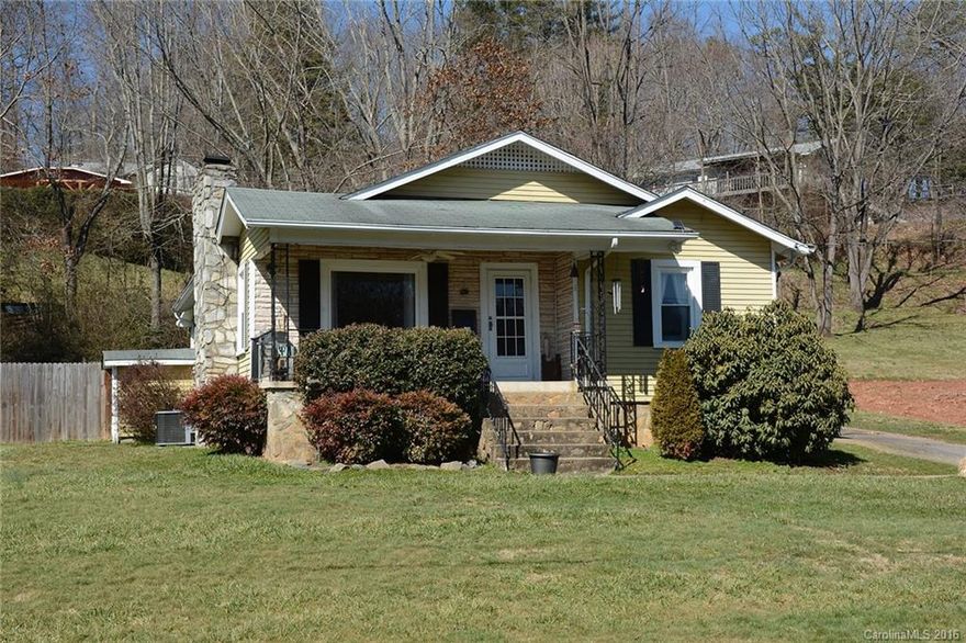 Adorable, inviting home that draws you in the minute you step on the covered front porch.  Very well taken care of 3 bedroom, 1 bath home with many recent upgrades including new kitchen and heat pump.  Beautiful hardwood floors; tongue & groove ceilings in many rooms. Curl up in the living room w/ the gas logs in fireplace & smell the aroma of pot of soup cooking in the new kitchen.  Large back yard with privacy fence is great for kids or pets.  This is a must see with the best location around!