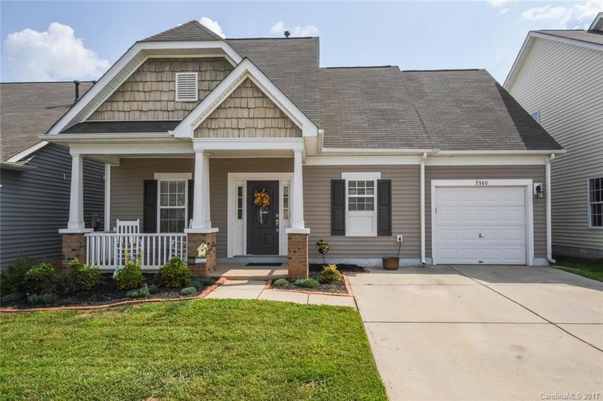 Cute As Can Be Home In Sought after Arlington in Excellent School District. Incredible Location in Indian Land for this well maintained home with one car garage and great curb appeal. Kitchen has good cabinet space & is open to living room. Master down with large shower in master bath, 2 bedrooms up with loft area in between & full bath. Back patio is unbelievably nice with very large covered area and large uncovered area for relaxing any time of the day. Yard is fenced and outbuilding to stay.