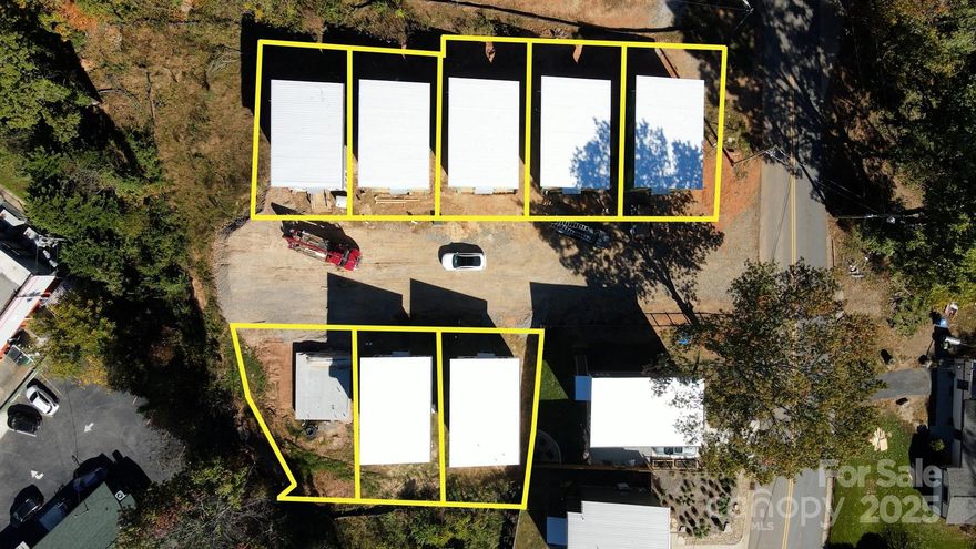 NEW IMPROVED PRICE:  West Asheville Brand New Construction Pocket Neighborhood consisting of 8 Adorable Homes with mountain vies.  All 8 homes and common area is being sold together as an INVESTMENT OPPORTUNITY.  Some homes are still under construction.  Bamboo floors and tile throughout the main level with exposed beams in the living room.  Great blend of modern fixtures with warm feelings throughout.  All homes will be subject to an HOA.  Located just off New Leicester Hwy with shopping and restaurants nearby.