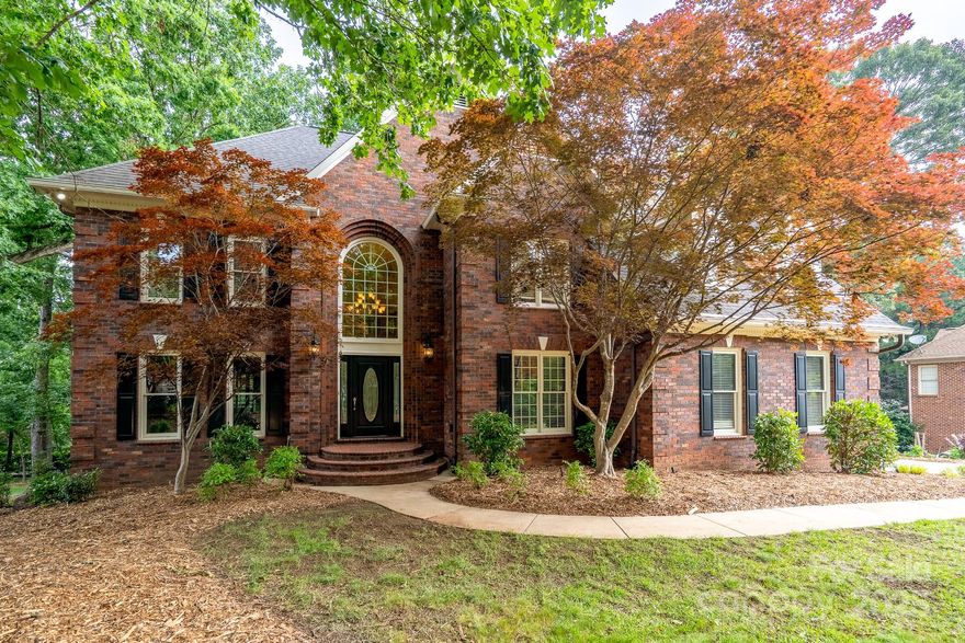 Welcome to this stunning full-brick beauty atop the hill in the desirable Bradford Park neighborhood! Surrounded by mature trees, this home offers charm, space, and privacy. A wrap-around driveway leads to the basement garage with private exterior access—perfect for second living quarters or guest space. Inside, enjoy a dreamy primary suite with tray ceiling ambient lighting, a sitting area, and a spa-like bath with heated floors! Enjoy 3 outdoor living spaces, including a private backyard retreat ideal for relaxing. Whether you're sipping coffee on the upper deck, grilling on the main deck, or enjoying a quiet moment on the covered patio, this home has the perfect space for every mood. The neighborhood is packed with fun also, offering an outdoor pool, playground, pickleball & tennis courts, plus family-friendly social events year-round. 4th bedroom has no egress in basement. Take advantage of instant equity, listed under appraised value!!!