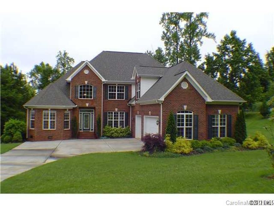 Full brick with lots of square footage. Huge master Suite on main level w/ well appointed Master Bath and his/hers walk-in closets. Main level includes private Office, large Dining Room, Great Room w/ fireplace, Den/Sunroom off of Breakfast Area which also includes a fireplace. Huge Kitchen features granite, large island and lots of counter space. Walk-in pantry w/ wood built-in shelving. Laundry room includes utility sink. Upper level is 4 bedrooms or 3 and Bonus Room. 3 car garage & Boatslip.