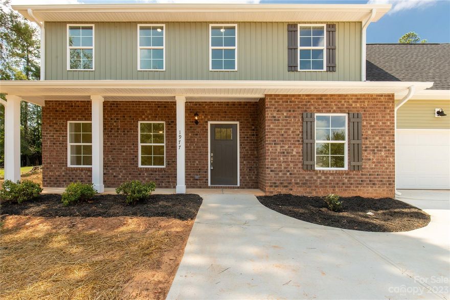 Welcome to this beautiful new construction home that's ready now!  Notice plenty of parking available including a turnaround area - perfect for extra guest parking!  Feel right at home when you enter with a large open plan featuring an office/den area, living room, and large great room overlooking the outdoor yard space.  The cook of the home will love all the counter space in this wonderful eat-in kitchen with a large pantry perfect for storage.  Upstairs you'll find not only a bright primary suite with dual vanity and large walk-in shower, but additional bedrooms and a 4th bedroom that could be a great bonus room.  Laundry room also conveniently located upstairs. 
 Relax after a long day on the back patio and enjoy the privacy of this nearly half acre lot.  The community also has a pool which is optional to join. Golfers will love the Crow's Nest driving range at the front of the community! Enjoy no HOA in this community! Builder offering buyer incentives - inquire for details!