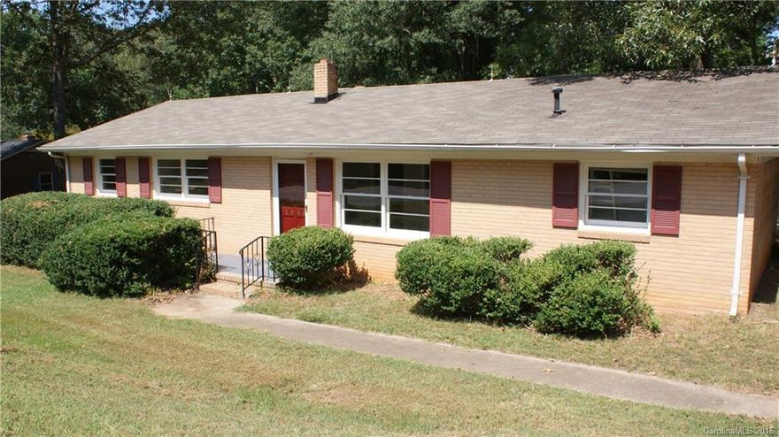 All brick house! New carpet, paint, bathroom fixtures and 16x20 workshop with electricity and new roof.  This 3 bedroom 1/1 bath is priced to sell and is sitting on almost an acre of land!  Huge family room with fireplace and built in book cases! Large kitchen and dining room.  Huge deck! A must see!