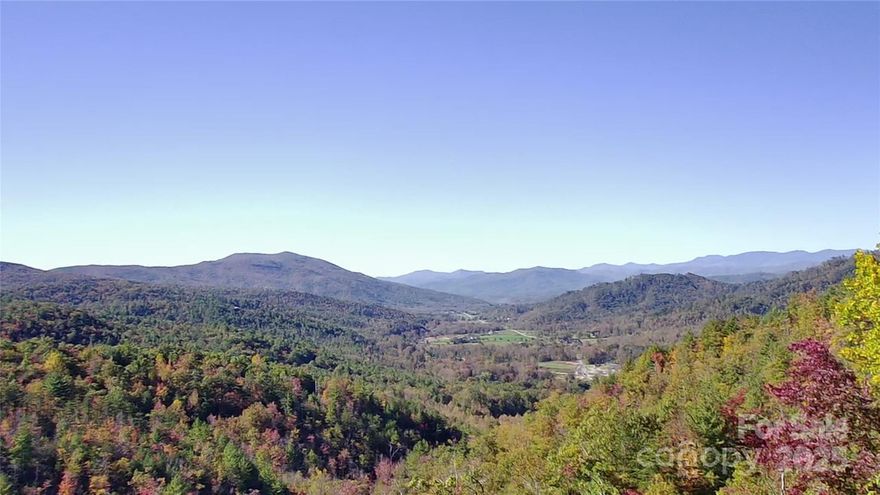 Escape to this rustic mountain cabin and soak in breathtaking long-range views from your own private retreat! Nestled near Linville Falls and surrounding recreation areas, this charming getaway blends comfort and adventure. The spacious wraparound deck and covered outdoor dining area make it perfect for entertaining or simply enjoying the peace and beauty of the mountains.

Inside, you'll find a cozy living space with gas logs, creating a warm and inviting atmosphere year-round. The open kitchen features a breakfast bar ideal for casual dining or morning coffee with a view. A charming loft area adds extra space for guests, an office, or a reading nook.

Whether you’re looking for a weekend escape or an investment rental, this cabin offers the perfect mix of rustic charm and modern convenience — all just minutes from hiking trails, waterfalls, and the natural beauty of the Blue Ridge Mountains.  All furniture, outdoor furniture, and any personal property conveys with the home.